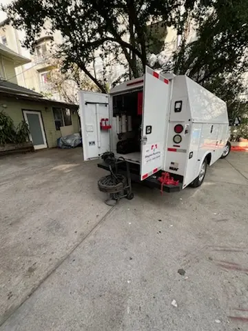 Magnet Plumbing service vehicle on-site for Grease Trap Cleaning in Hollywood Studio District